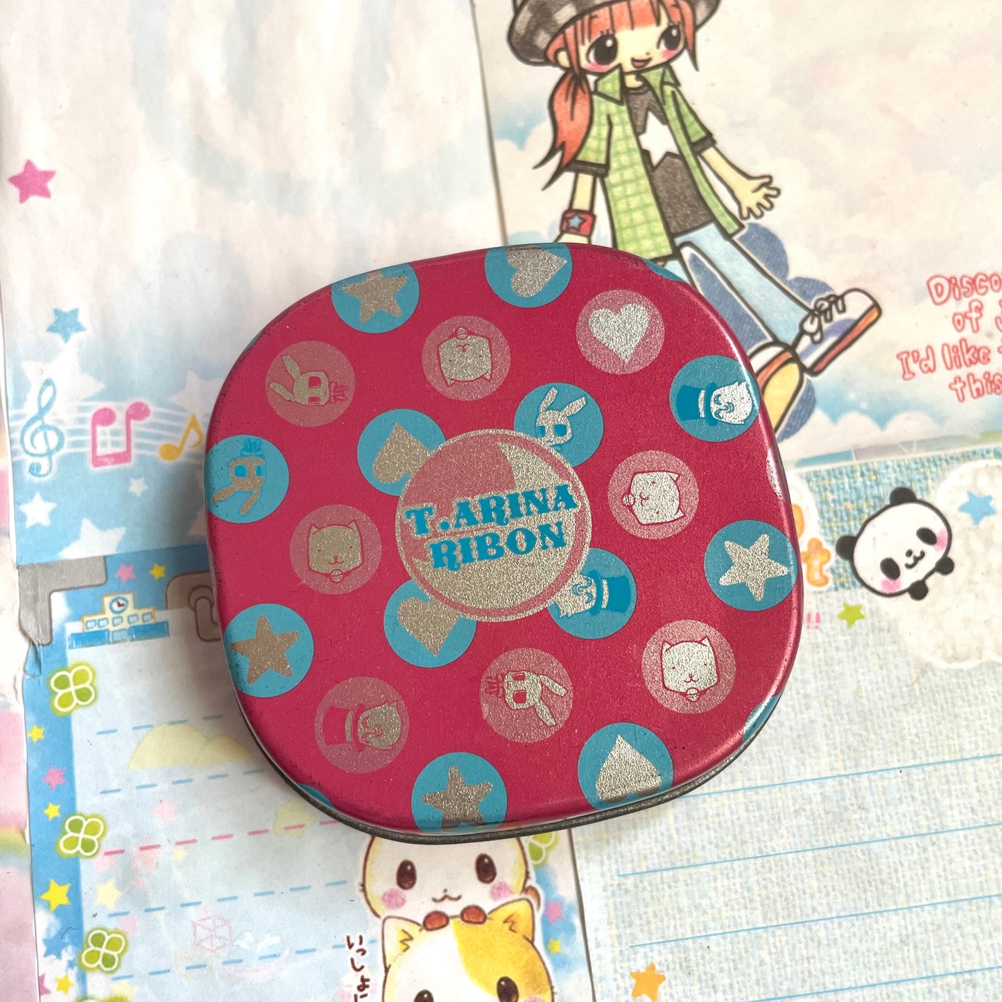 T. Arina Ribbon Tin Can Case