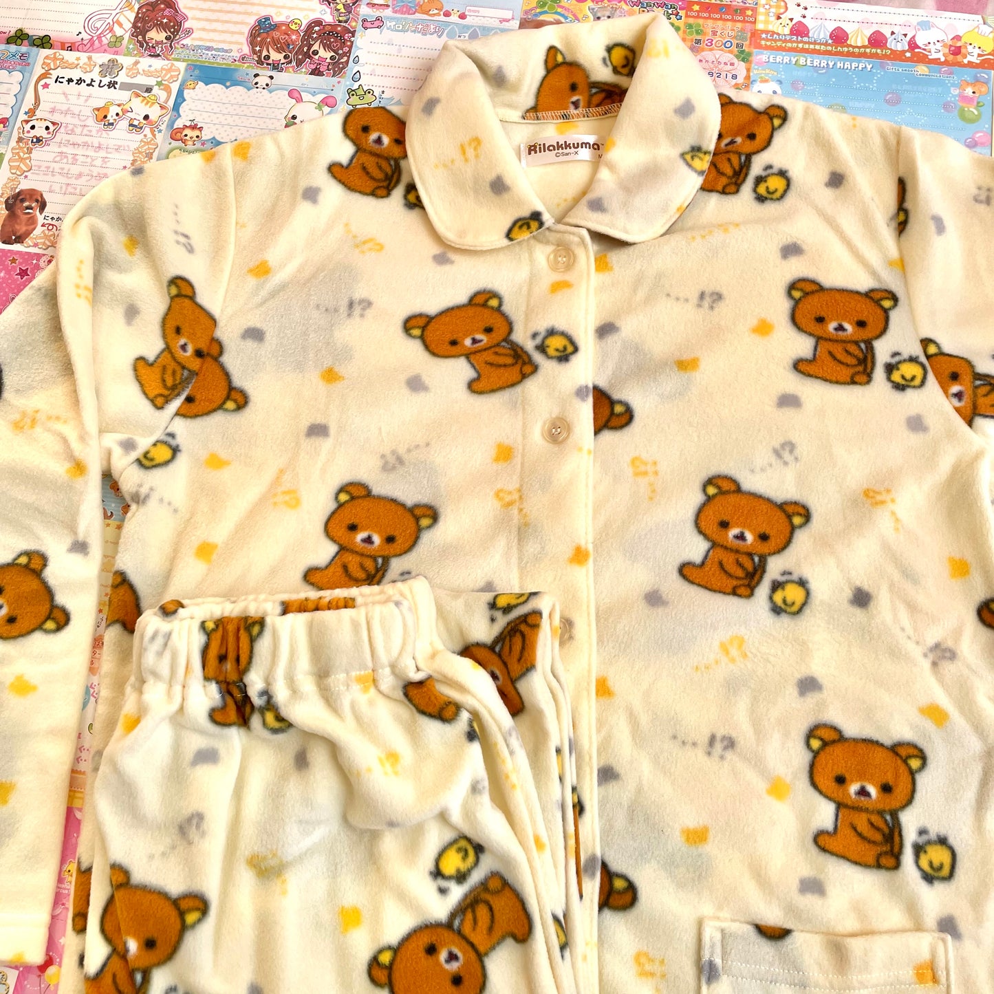 A set of 2 Rilakkuma M Fluffy Roomwear and a Drawstring Bag